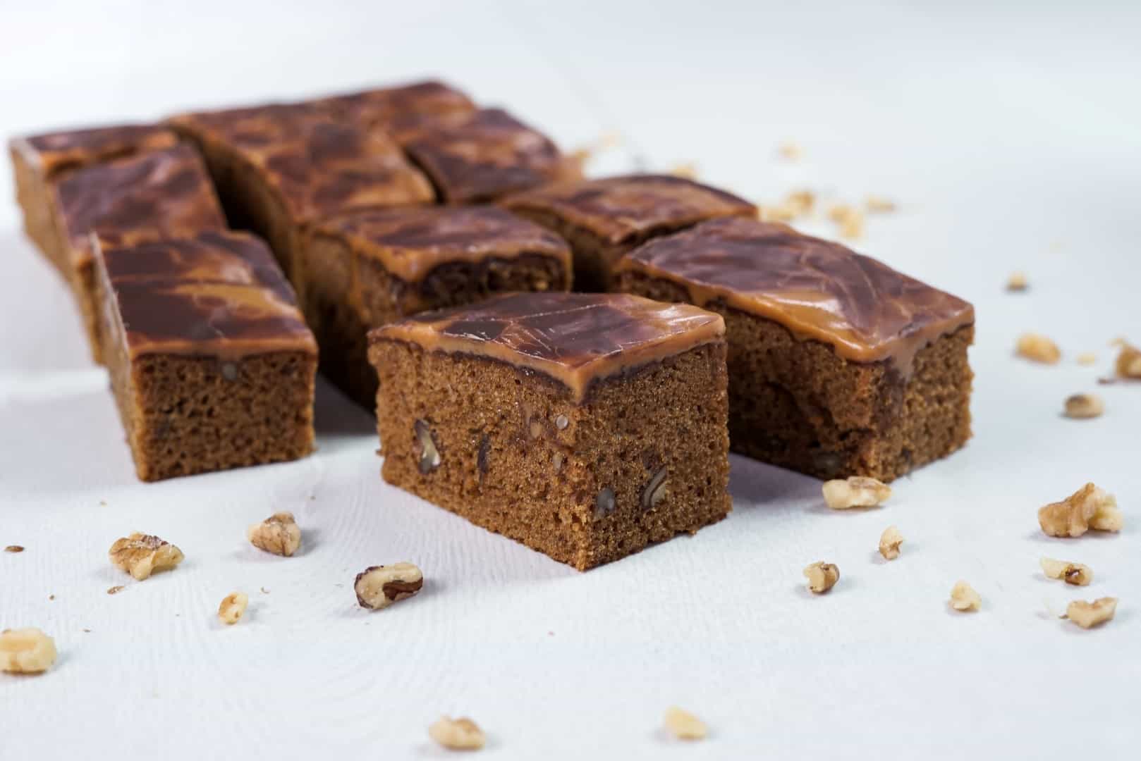 Coffee, Pecan and Salted Caramel Poke Cake Slice - British Bakels